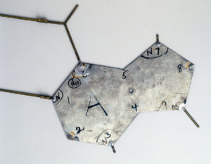 A metal plate representing a nucleotide in Watson and Crick’s DNA model.
